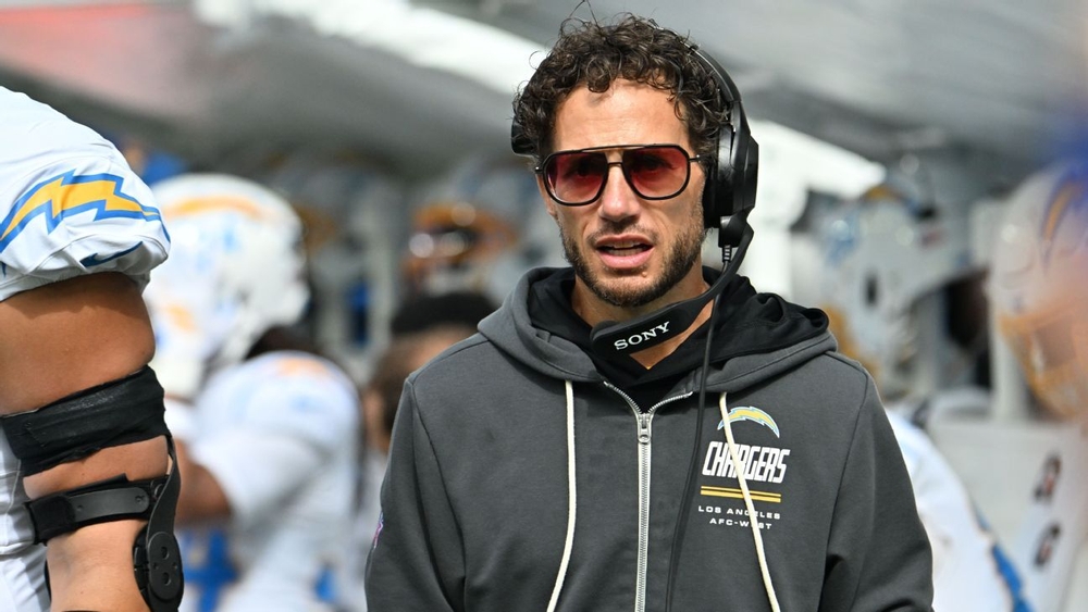 img of Harbaugh: Winless Chargers to stick with McDaniel as...