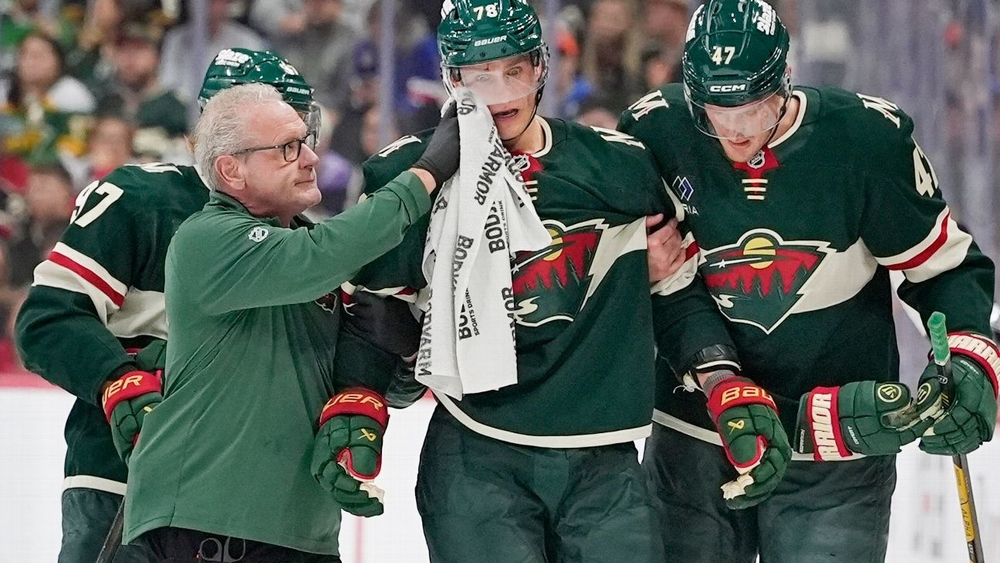 img of Sturm, 31, sent to hospital after puck strikes his...